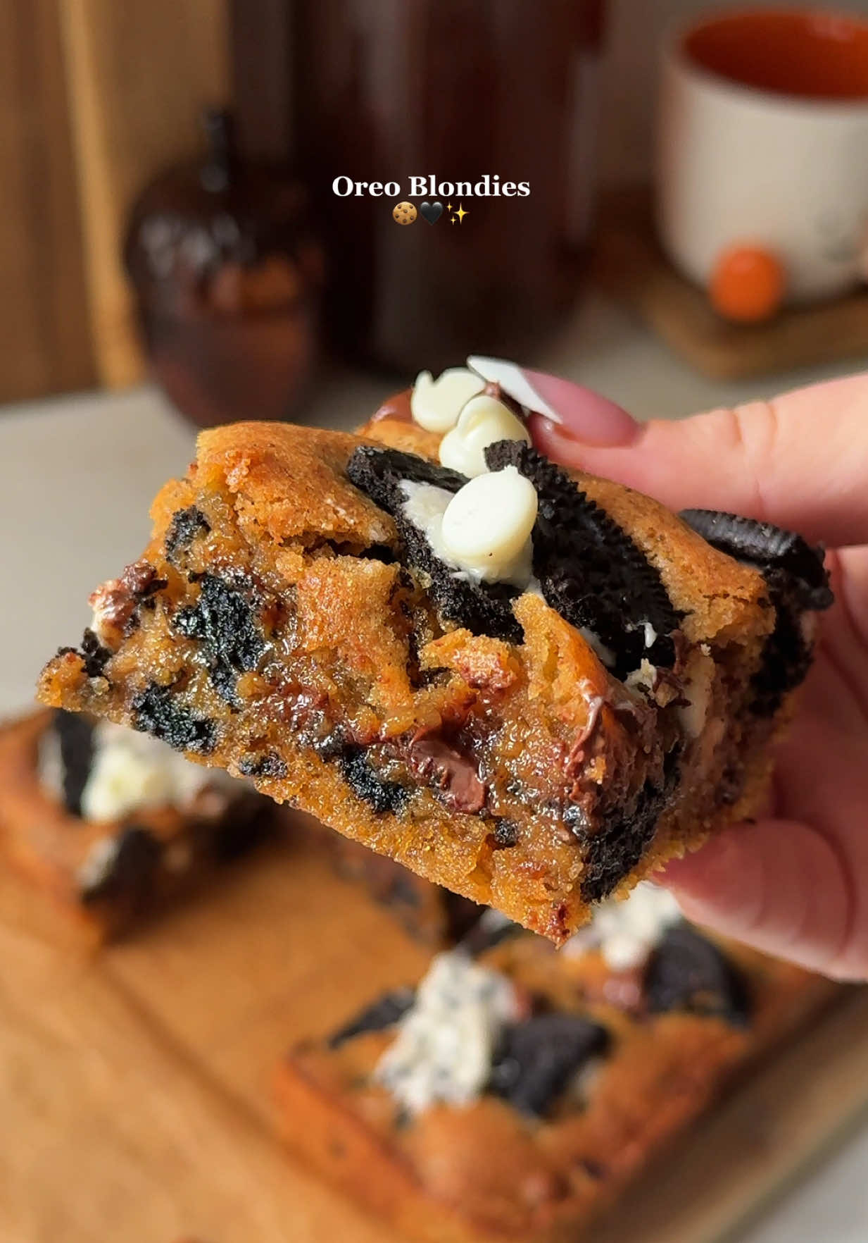 Oreo Blondies 🖤 - Ingredients: - 180g unsalted butter, melted and cooled - 3/4 cup + 2 teaspoons  - 50g granulated sugar - 1/4 cup  - 100g dark brown sugar - 1/2 cup - 2 large eggs - 1 teaspoon vanilla extract - 200g all purpose flour - 1 cup + 1/2 cup + 1 tablespoon  - 3g baking powder - 3/4 teaspoon - 100g Oreos, chopped up - 9 Oreos  - 50g white chocolate chips - 1/3 cup - 50g semi sweet chocolate chips - 1/3 cup Instructions: 1. Preheat the oven to 180•C and line a 20x20 cm square baking tim with parchment paper. Set aside. 2. In a large bowl whisk together the melted butter with the granulated sugar and the brown sugar. 3. Next mix in the eggs and vanilla extract until fully combined. 4. Fold in the flour and the baking powder until just combined. 5. Lastly, fold in the crushed Oreos, white chocolate chips and semi sweet chocolate chips. 6. Scoop the dough into your prepared baking tin. 7. Top with more Oreos and chocolate chips. 8. Bake in the preheated oven for 22-25 minutes. (Check on it after 20 minutes) 9. Once ready, let it cool in the pan for 30 minutes before slicing. 10. Enjoy! #oreos #cookiesandcream #baking #EasyRecipes #asmr 