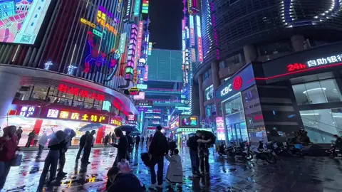 Rain, neon, pure cinematic vibes 🌧️✨ Osmo Action 5 Pro turns night streets into cyber-dream shots — sharp, moody, insanely smooth. #djiosmo #osmoaction5pro #cinematic #streetphotography #actioncam #trends