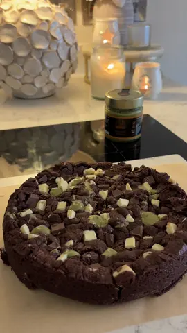 Triple Chocolate Pistachio Cookie Pie 🤎🤎🤎 1) In a bowl whisk 120g melted butter, 125g light brown sugar and 90g granulated sugar.  2) Add 1 egg and 1 tsp vanilla extract and whisk again.  3) Add 280g plain flour, 30g cocoa powder, 1 tsp baking powder, 1/2 tsp bicarbonate of soda and 1 tsp salt and fold until a dough forms.  4) Add 100g milk chocolate chunks and 100g white chocolate chunks and mix until well integrated throughout the dough.  5) Split your dough into three and construct the base and sides of your pie.  6) Add 200g Michaels Pistachio Cream and smooth over.  7) Add your lid and bake at 165 degrees celcius for 20 minutes.  8) Wait for your pie to cool fully if you are cutting into it, if you want to enjoy it warm then leave it for a smaller amount of time! Enjoy!!! #chocolate #cookie #cookiepie #pistachio #foryoupage 