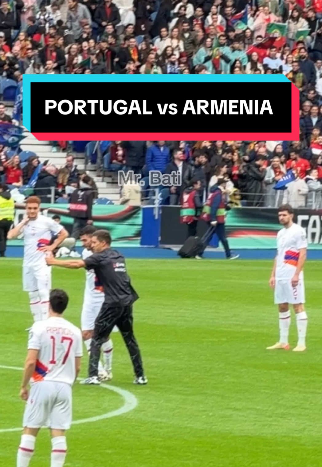 Armenian fan jumps onto pitch during Portugal-Armenia match, takes selfie with Muradyan  Portugal and Armenia are playing in the final match of Group F in the 2026 FIFA World Cup European Qualifiers. Before the kick-off, a fan entered the pitch and took a selfie with Armenia's Muradyan. Security forces struggled to apprehend the fan. Cristiano Ronaldo, who received a red card in the Ireland match, is unable to play in this match. #Portugal #Armenia #worldcup #fyp #football 