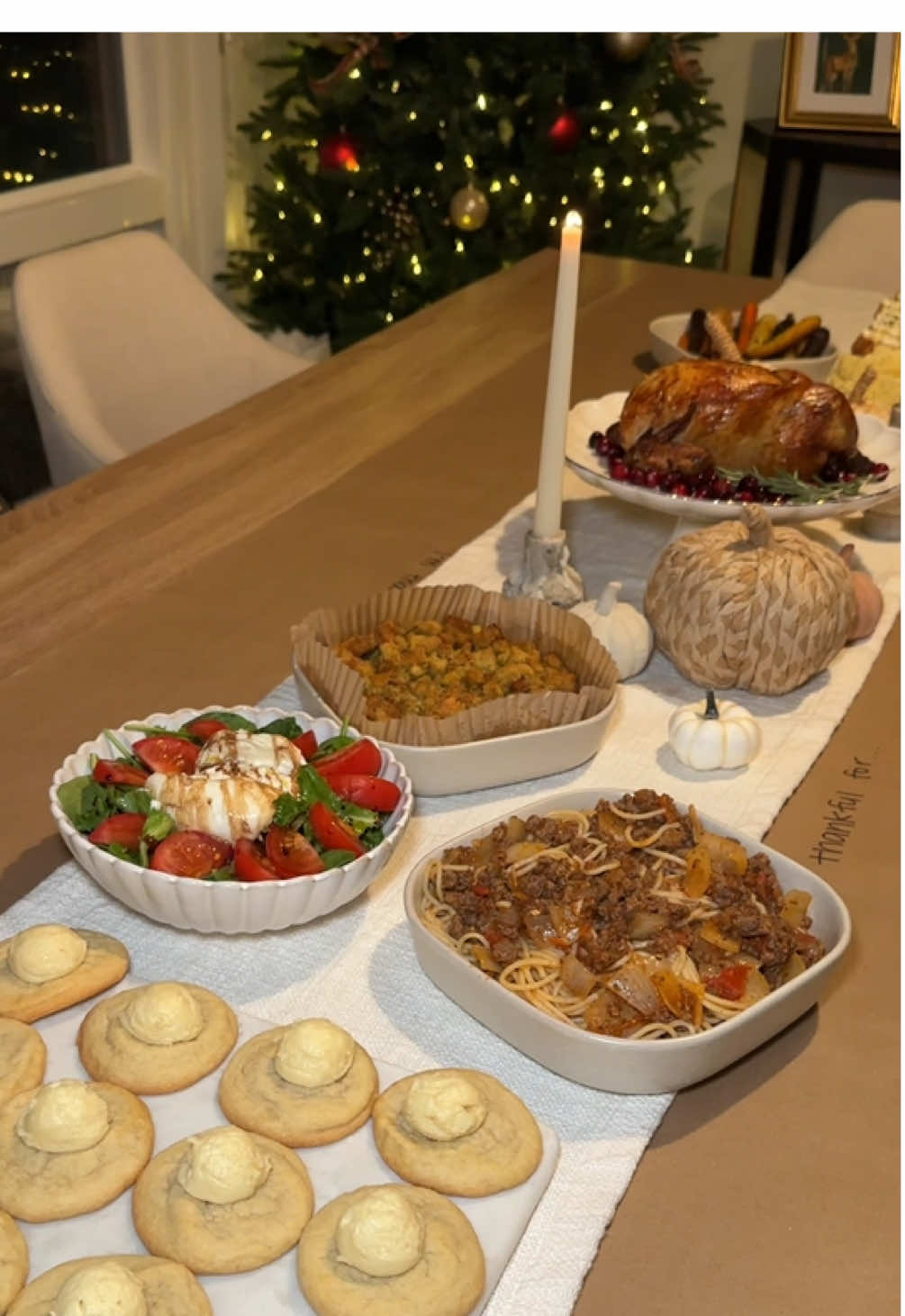 Our Friendsgiving menu 🥖🍝🥂 • Truffle goat cheese stuffed dates • Lemon ricotta crostinis • Brown butter mashed potatoes • Brown sugar glazed carrots • Rotisserie chicken • Bolognese pasta • Stuffing • Salad with burrata  • Sugar cookies with almond butter cream frosting  • Apple cider spritz  #thanksgiving #easy #dinner #ideas #hosting 