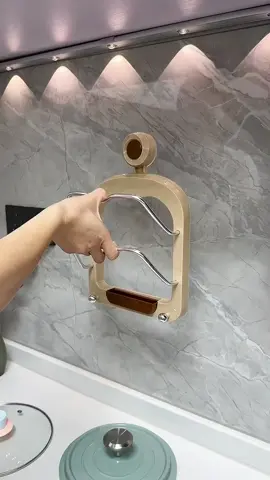 Install a suction cup pot lid rack next to the stove. It can store pot lids of all sizes, as well as cutting boards, making the countertop much tidier. #potlidrack #kitchen