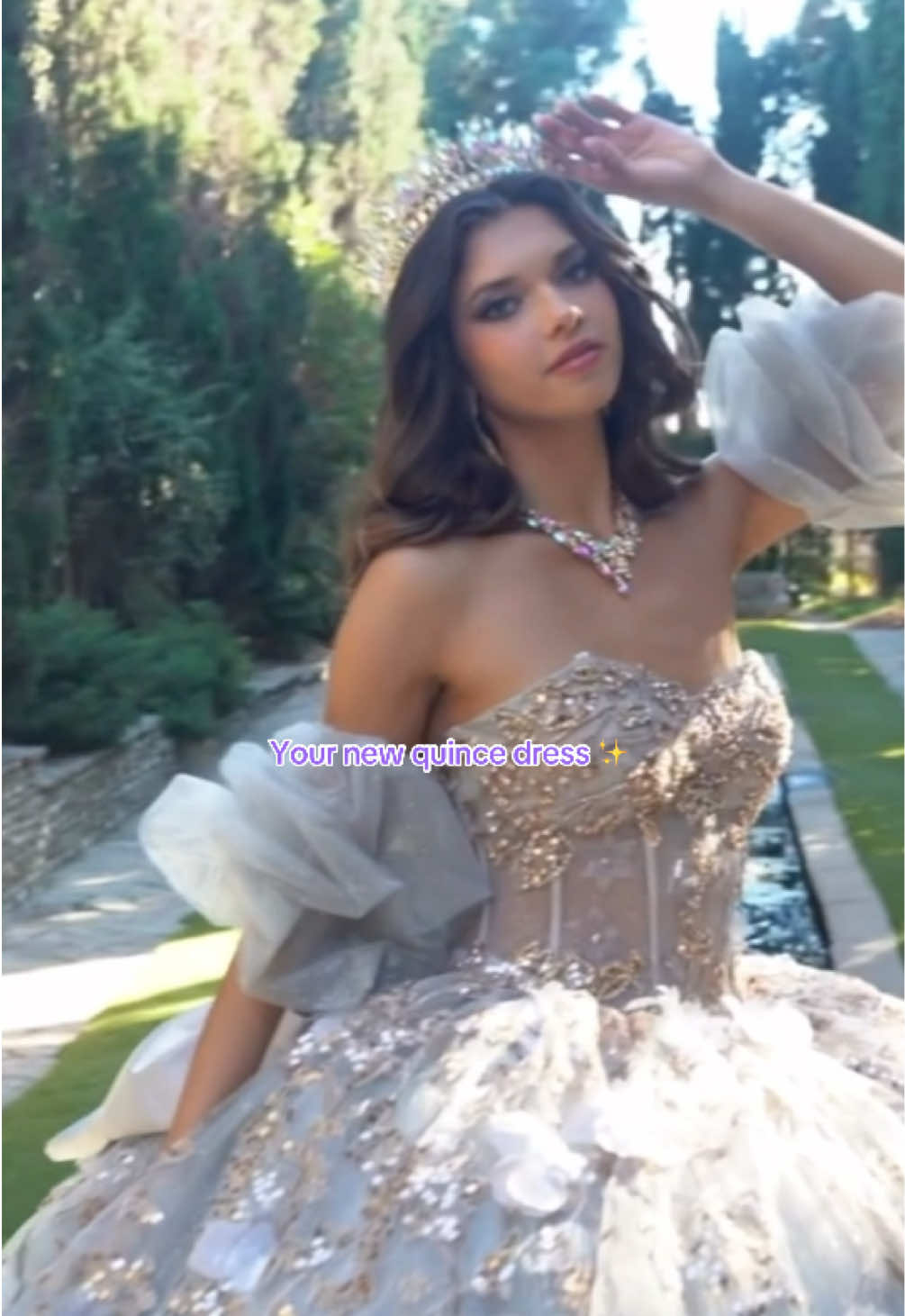 When your quince dress makes you feel like royalty 👑✨  The Bella Princess Couture metallic strapless corset ball gown by Petite Adele (PQ1078) is pure main character energy. #dressesforwomen #quinceañera #sparklydress #quinceaneradress #ballgown  