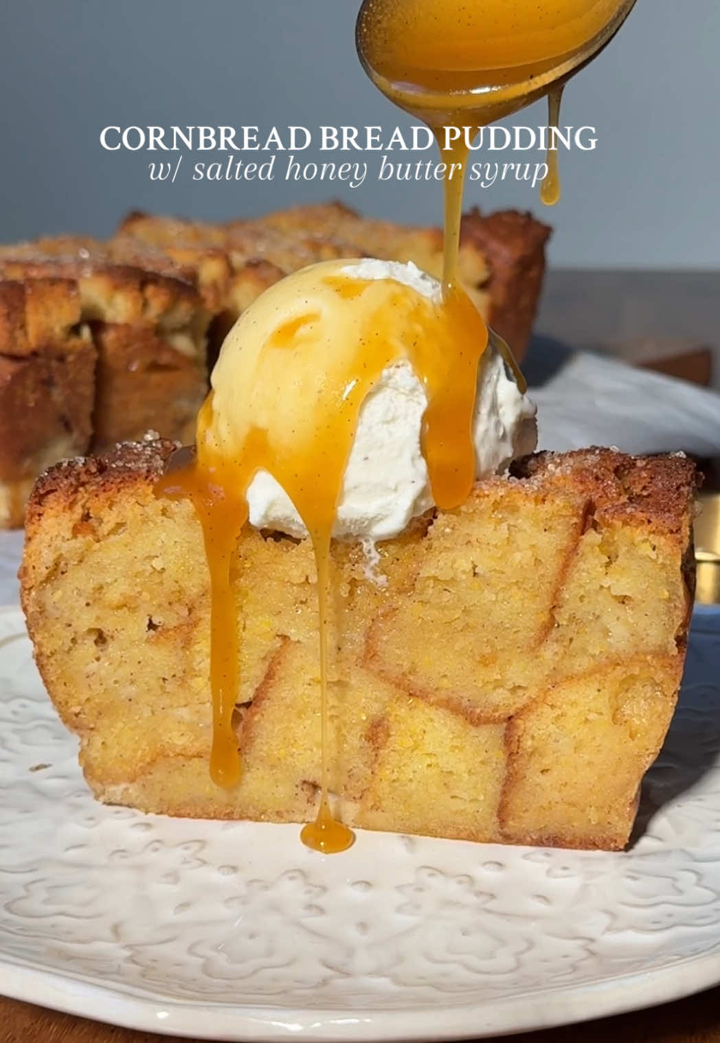 CORNBREAD BREAD PUDDING W/ SALTED HONEY BUTTER SYRUP I want to be that salted honey butter syrup just sliding down the ice cream 🙂‍↔️ Think soft, buttery cornbread soaked in a rich vanilla bean custard, baked until the top turns golden and lightly crisp, and served warm with a salted honey butter syrup that soaks into every crevice  ✨ It basically turns into this sweet, custardy, slightly caramelized pudding that melts in your mouth…and it’s unbelievably comforting in all the best ways 🤌 Recipe below OR go to my website at wellmadebykiley.com 🤎 #Recipe Details (serves 8-10): Ingredients: - 3-4 cups cubed cornbread (I used an entire pack of @Bob’s Red Mill Cornbread Mix and baked per the instructions), preferably left out overnight  - Optional: turbinado or coarse sugar of choice, for topping - Vanilla ice cream, for serving @Tillamook  - Flaky sea salt, for serving Vanilla Bean Custard: - 1 cup (240ml) milk of choice - 1 cup (240ml) heavy cream - 1/4 cup (55g) granulated sugar - 1 tsp (4g) vanilla bean paste or extract @Nielsen-Massey Vanillas  - 1 tsp (2g) cinnamon - Large pinch of salt - 4 eggs, at room temperature - 2 tbsp (28g) salted butter, melted and slightly cooled Salted Honey Butter Syrup: - 1/2 cup (113g) salted butter @KerrygoldUSA  - 2/3 cup (225g) honey - 1 tsp (4g) vanilla bean paste or extract - Small pinch of salt Instructions: Preheat the oven to 350F. Grease a standard 9x5” loaf pan or small casserole dish with butter or cooking spray, then line with a sheet of parchment paper, making sure it is tall enough to drape over the sides a little. Set aside. If your cornbread wasn’t dried out overnight, start by lightly toasting it in the oven. Spread the bread cubes on a baking sheet lined with parchment paper. Bake at 350F for 7-10 minutes, until LIGHTLY toasted; you want to be careful to not bake the bread, you just want a light toast on the outside! Remove from the oven and set aside to use later. Prepare the custard. In a large bowl or measuring cup, whisk together the milk, heavy cream, sugar, vanilla, cinnamon, and salt until well combined. Add the eggs and whisk until fully and well combined (you want to make sure that there are no ribbons of egg). Then as you continuously whisk, stream in the melted butter until fully combined. Place all of the cornbread cubes into the prepared pan. Slightly press down. Then, pour the vanilla bean custard all over the cornbread, making sure all of the pieces are well-soaked. With the back of a wooden spoon, gently press down on the bread to make sure there are no dry parts. Then, sprinkle the top with turbinado sugar if desired. Let rest for at least 30 minutes. *At this point, you can place into the refrigerator covered overnight, or bake after the 30 minutes of resting. If letting it soak overnight — you can remove from the refrigerator and bake immediately the next day whenever you’re ready.* Once ready, bake at 350F for 45-55 minutes, until the top is golden and set, but the middle is still slightly wobbly when shaken. While the bread pudding is baking, prepare the salted honey butter syrup. In small saucepan, gently melt the butter, honey, vanilla and salt together, whisking to combine. Once the butter is melted and the mixture is smooth, you can either serve it straight from the saucepan or transfer to an airtight jar or container until ready to serve. Remove the bread pudding from the oven and let rest for at least 10-15 minutes. Slice and serve warm with a scoop of vanilla ice cream, a drizzle of the salted honey butter syrup, and a sprinkle of flaky sea salt, if desired. Enjoy! #cornbreadbreadpudding #saltedhoneybuttersyrup #thanksgivingrecipe #dessert 