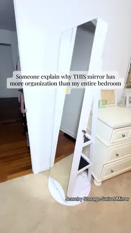 If your jewelry is always tangled or missing, this floor mirror is the upgrade your room has been waiting for. It opens into a full hidden organizer with space for all your necklaces, earrings, and beauty essentials—and the back shelves make your room feel like a mini boutique. Clean, organized, aesthetic, and actually useful. This is the easiest ‘treat yourself’ or holiday gift that instantly makes your space feel elevated. #HomeOrganization #RoomMakeover #GiftsForHer #HomeEssentials #AestheticRoom