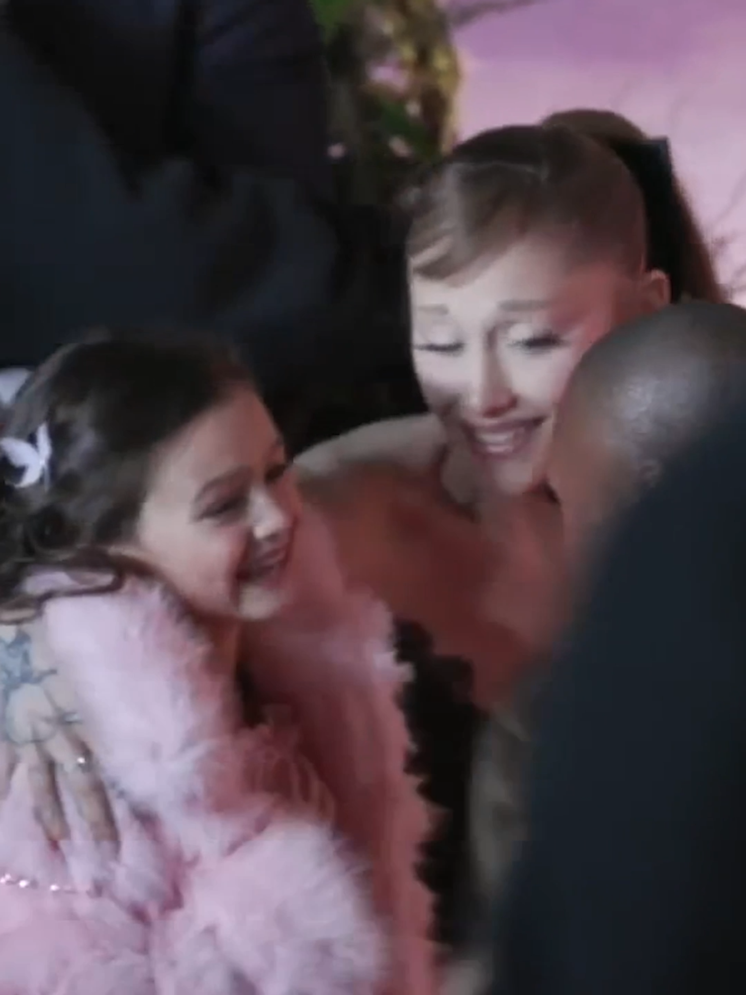 #ArianaGrande and #CynthiaErivo hug and say hi to Scarlett Spears at the #WickedForGood premiere Variety On The Carpet presented by @lexususa