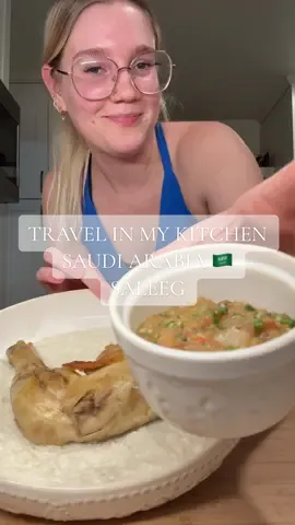 TRAVEL IN MY KITCHEN WITH ME: Saudi Arabia🇸🇦 Saleeg!  This dish was honestly one my favorites. The creamy rice was soooo good paired with the chicken and spicy sauce. My husband also raved about it!  I struggled with the chicken legs.. not gonna lie 😅 I need more practice with them! I don’t usually deal with bone-in meat. And then it stuck to my pan!! I didn’t get that beautiful dark color on the chicken like the videos showed but I hope I can do better next time!  The daqoos was DELICIOUS. I think I could dip anything in it 🤣 I used Serrano peppers for mine!  This dish has been requested hundreds of times since my very first video from this series so I knew I had to do it but let me know anything else I should try from Saudi Arabia!  Next week we are prepping for MEXCIO 🇲🇽 I’m soooo excited!!!! Leave all your suggestion for me!!  #saudiarabia🇸🇦 #food #newfood #saleeg #homemade 