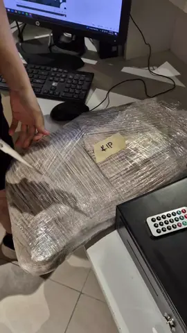 unboxing a package at Boulder Story