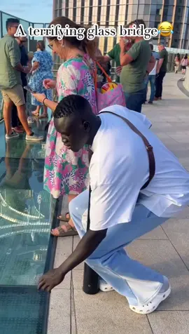 Afraid of glass bridge😂#afraid #glass #glassbridge #prank #funny #funnyvideos 