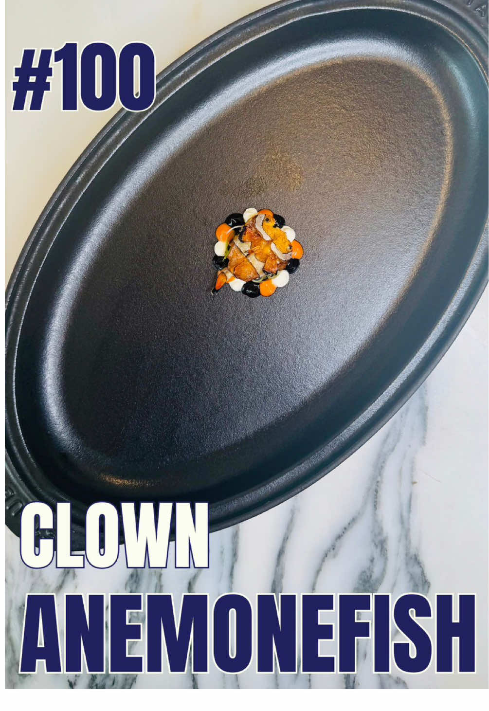 COOKING EVERY FISH IN THE WORLD 🐟 🌍  Episode 100 - Clown Anemonefish / Ocellaris Clownfish • BIN: Amphiprion ocellaris FR: Poisson-clown à trois bandes / poisson-clown ocellé DE: Falsche Clownfisch / Orangeringel-Anemonenfisch ESP: Pez payaso común / falso pez percula  IT: Pesce pagliaccio ocellato SRB-CRO: Riba klovn • Ingredients (15-20 canapés): 15-20 clown fish (or any marine fish of similar size) Mayonnaise base: 1 egg yolk 1 tbsp Dijon mustard 200-250 m grape-seed oil Black mayo: 1-2 cloves black garlic 1 tsp squid ink Orange mayo: 0,2 g Saffron 1 tbsp tomato paste Cream dip: 3 tbsp cream cheese 1 tbs crème fraîche 1/2 lemon zest Spring onion (garnish) • Recipe: 1. Cut the fish into a butterfly fillet as shown in this reel and secure with two needles. 2. Nemo dip: whisk up the mayo, divide into two parts and combine with the respective ingredients. Do the same with the two creams.   3. Matsukasa-yaki: place the butterflied fish skin-side up onto a rack and gently ladle over 220C hot oil until golden crispy. Serve with the Nemo dip and enjoy!! • #findingnemo #fish #fishrecipe 