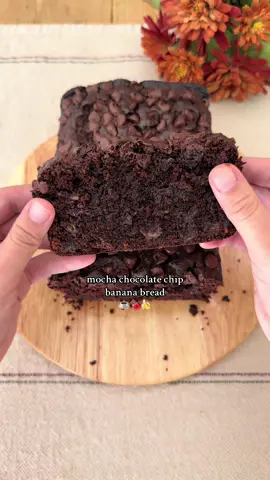 Mocha Chocolate Chip Banana Bread 🍫☕️ A super moist double chocolate banana bread with espresso powder added in!  (Makes one 9x5 loaf pan) Ingredients: ½ cup (113g) unsalted butter, melted & slightly cooled  1 cup (200g) brown sugar, packed 2 eggs, room temp 1½ tsp vanilla extract 3 ripe bananas, mashed ¼ cup (60g) sour cream or greek yogurt, room temp  1¼ cups (160g) all-purpose flour ½ cup (50g) unsweetened cocoa powder (reduce to ⅓ cup/30g if you want the coffee flavor to shine more)  1 tbsp espresso powder (i use king arthur)   ½ tsp cornstarch (optional) 1 tsp baking soda ½ tsp salt 1 cup (170g) semi-sweet chocolate chips (plus extra for topping) Instructions: Preheat oven to 350°F (175°C) and line/grease a 9x5 loaf pan. Whisk together butter and brown sugar. Mix in eggs, vanilla, mashed bananas, and sour cream/ greek yogurt until combined. In a separate bowl, combine flour, cocoa powder, espresso powder, cornstarch, baking soda, and salt. Add dry ingredients to wet and mix until just combined. Don't over mix. Fold in chocolate chips gently. Pour into loaf pan and top with extra chocolate chips. Bake for 50-65 minutes or until a toothpick comes out clean/with a few moist crumbs. Cool before slicing, enjoy! #bakingrecipe #bananabread #doublechocolate #mocha 