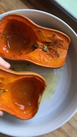 Maple Roasted Honeynut Halves! There is something so fun about being able to serve a whole squash on a single plate- it is equal parts rustic and sophisticated. The recipe below is for eight servings, but is easily doubled/halved to make sure you have as many as you need!  4 Medium Honeynut Squash 1/4 Cup Maple Syrup 1/4 Cup Olive Oil 2 Tbsp Fresh Thyme Salt and Pepper to taste Method Preheat the oven to 425°F.  Cut each honeynut squash in half, slice off the stem end, and then scoop out and discard the seeds.  Combine maple syrup and olive oil in a spouted measuring cup. Whisk to combine then add fresh thyme.  Place each squash half cut side up on a lined baking sheet. Using a pastry brush, brush the tops of each of the squash halves with the maple-olive oil mixture, then divide the remaining liquid between each scooped-out well of the squash halves.  Carefully transfer the squash into the oven and bake for 45 minutes or until the squash tops begin to caramelize, the skin browns further, and they are easily pierced with a fork. For the best results use a spoon or a baster to transfer some liquid from the well of the squash to the top.  Serve while hot, with the maple liquid intact, it makes for the best dipping sauce! #thanksgivingrecipes #recipes #veganrecipes #vegetarianrecipe 