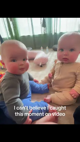 The first time they really noticed each other, AND made each other laugh! #boygirltwins #fraternaltwins #twinmom #6monthsold #laughingbaby 