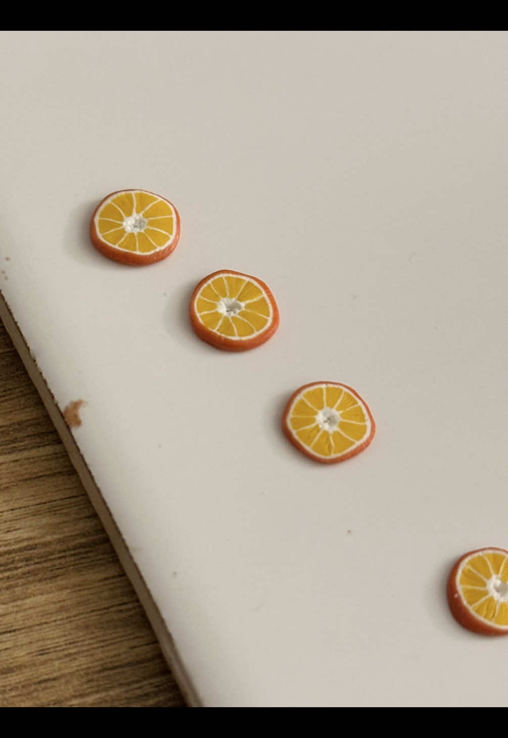 Tried my hand at an orange clay cane 🍊 #polymerclay #polymerclayearrings #clayearrings #handmade #handmadejewelry 