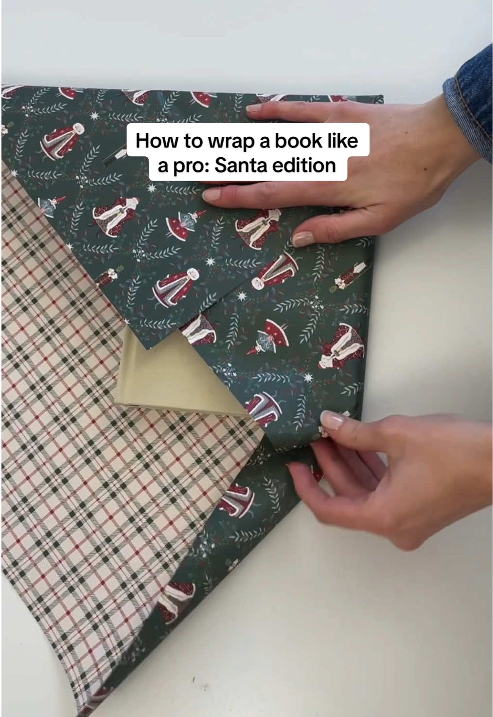 How to wrap a book like a pro: Santa edition! 🎅 #giftwrapping #giftwrap #wrappinggifts #fyp #christmas 