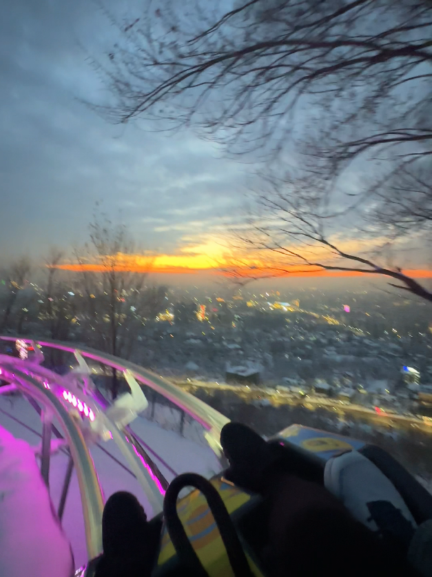 One of our favorite activities in Almaty! It was sooooo fun aaaaaah! You can control the speed of the coaster and it also allows two passengers.  The snow, the sunset and the lights were all so perfect ❄️🌆  w @NeilChris  🤍 #koktobe #almaty #kazakhstan #centralasia #traveltiktok 