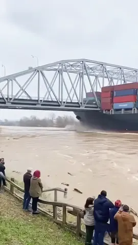 A Cargo Ship Gets Swept by a Strong River Current and Crashes Into a Bridge!