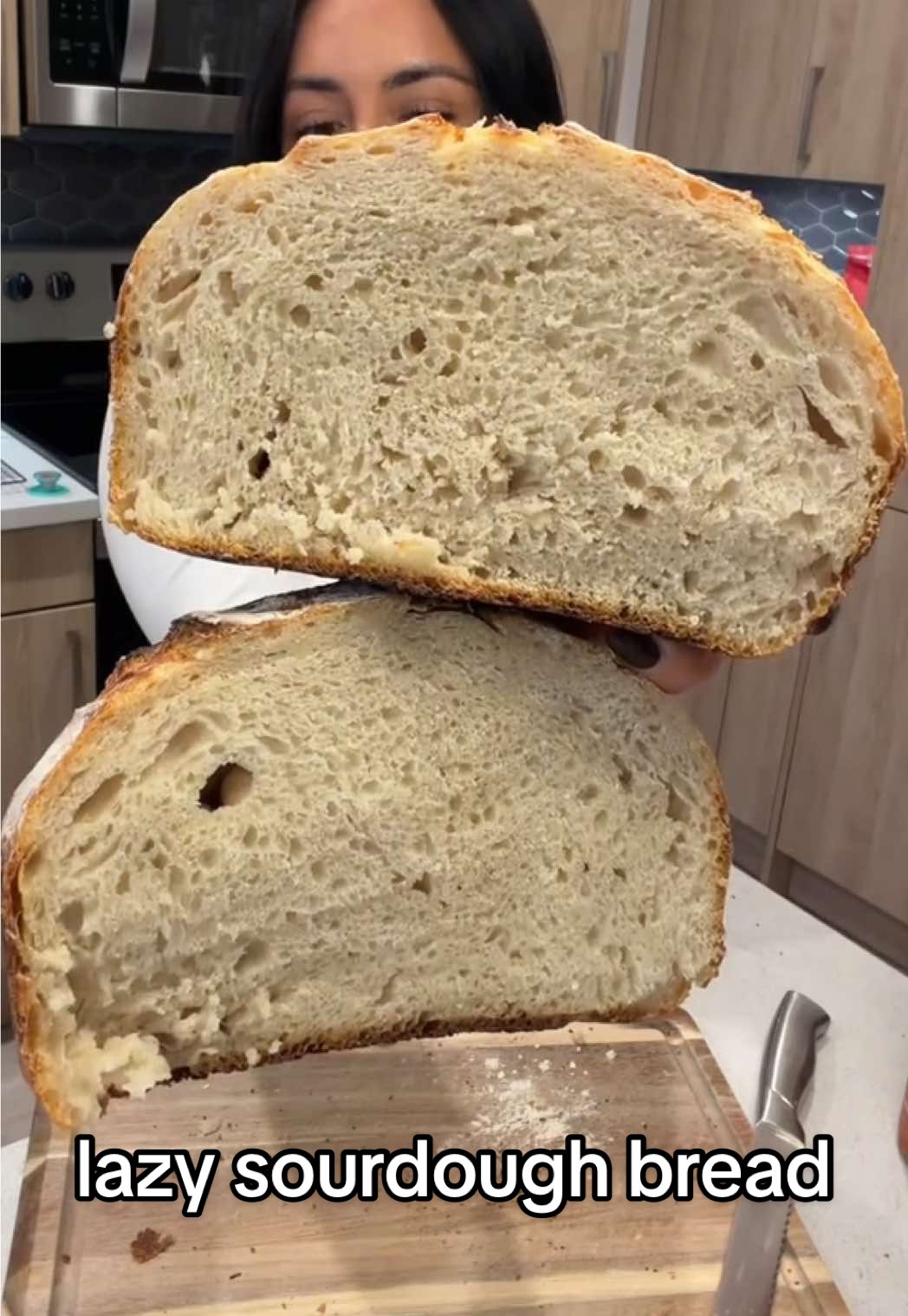 making sourdough bread ✨the lazy way✨ recipe from @itshomemadehoney 🤍🍞  LAZY SOURDOUGH RECIPE🤍 *makes 2 loaves Ingredients 165g active starter 400g water 650g bread flour 15g salt Directions 1. Combine all ingredients 2. Cover and rest for 3-12 hours (approx. 10 hours for our house temp) 3. Do one set of stretch and folds, flour and shape the dough 4. Place in a bowl lined with towel & flour, cover and rest 1 hour 5. Put in the fridge overnight 6. Next day, score & line dutch oven with parchment paper, bake in a cold oven, set timer to 1 hour and temp to 450 F. I remove the dutch oven lid after 45 minutes and let the top brown. Let cool and enjoy 🍞🍞 #sourdoughbread #sourdoughstarter 