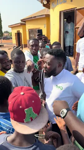 Richard Nii Armah Quaye shares money to the people of Tamale as he prepares to open his food bank there