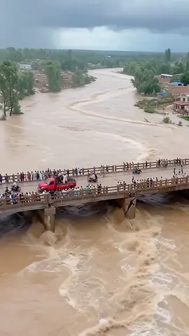 The bridge collapsed in a split second! Cars plunged into the raging torrent and were swallowed by the massive whirlpool. #Bridge #car #flash #flood #weather #river #breaking #news #nature #power 