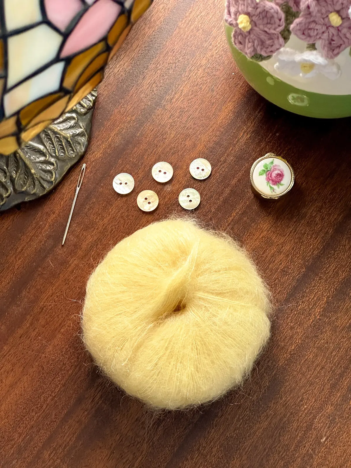 One of the best parts about choosing a new knit project is finding the perfect buttons, I tend to go for mother of pearl. Here’s all of my @dropsdesign kidsilk and matching drops buttons! #knitting #knittersoftiktok #knittok #yarntok #yarnlovers #motherofpearlbuttons #dropsdesign #mohair 