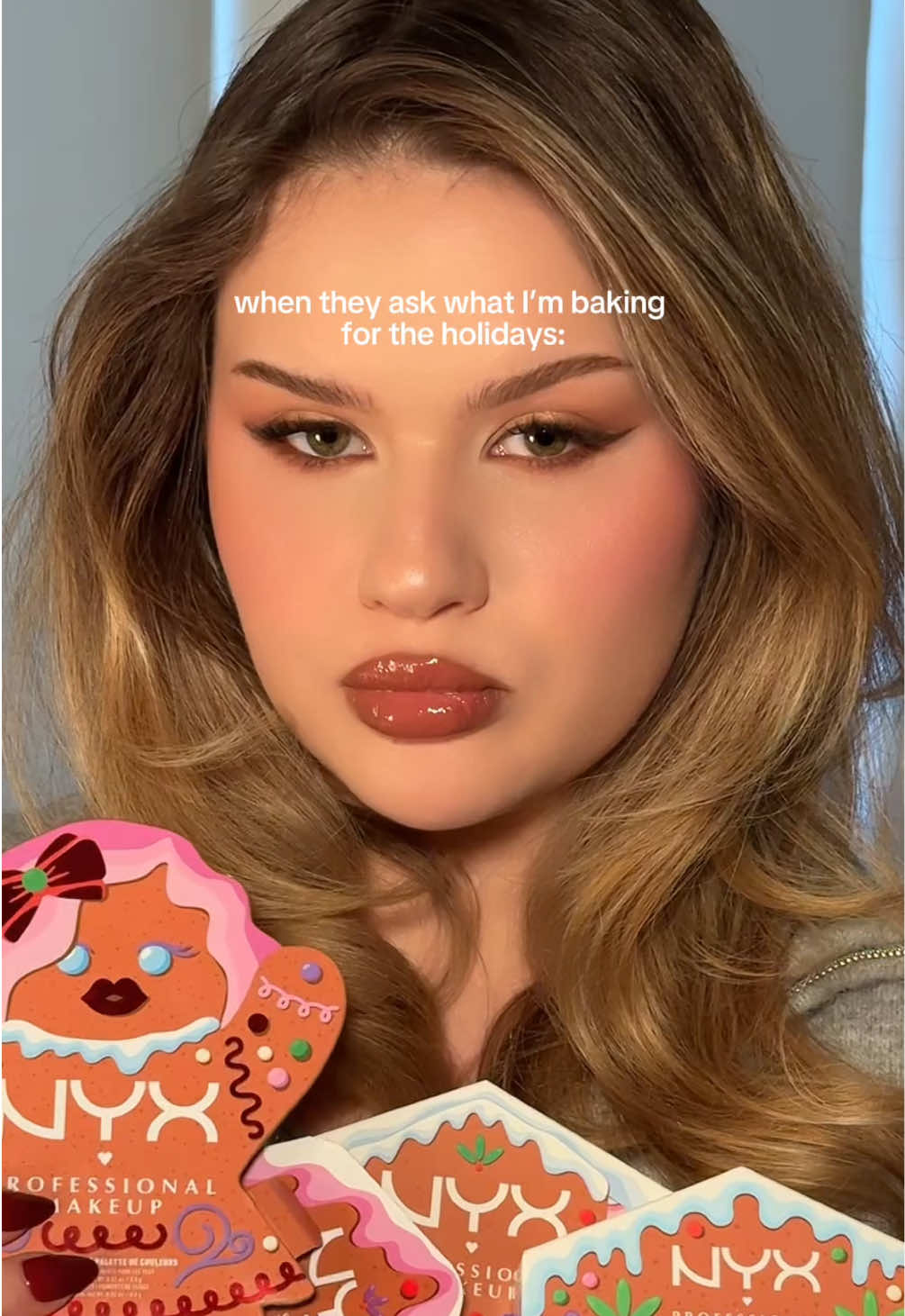 toasty holiday glam coming right up 🧑‍🍳💋🎄 using @NYX Professional Makeup holiday collection products used: buttermelt face palette shade mulled and merry color palette eye pigments  epic ink liner shade milk chocolate gum drop gloss hydrating gloss serum shade hydra-honey #ad #toastymakeup #warmtones #holidayglam