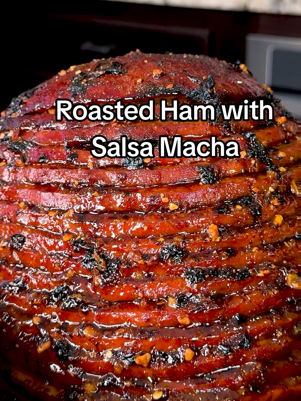 Roasted Ham with Salsa Macha Recipe For Thanksgiving! 😋 This ham was such a hit last year that I had to bring it back! Inspired by an episode of @Selena Gomez  + Chef, where the amazing @Claudette Zepeda shared this incredible idea, roasted ham paired with bold, smoky salsa macha. We made it, we fell in love with it, and now it’s officially a yearly tradition in my kitchen. ROASTED HAM WITH SALSA MACHA INGREDIENTS: For the salsa macha: ► 3 cups avocado oil ► 8 chiles ancho ► 4 chiles de arbol ► 1/2 white onion ► 6 sliced garlic cloves ► 1/2 cup peanuts ► 1 1/2 cups of honey ► Some salt For the ham ► 8 lb. ham ► Sesame seeds #mexicanrecipes #salsamacha #EasyRecipe #recetasfaciles #thanksgiving 