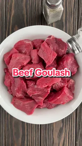 Polish Beef Goulash! 🥩 This hearty and meaty stew is one of my favorite family recipes 😍 Save and share this recipe for later 🔖  Ingredients: 1 (2.5 lb) Chuck roast, cut into 1/2 inch cubes Salt and pepper, to taste 1 large diced onion 4 cloves minced garlic 2 cups beef broth 1/3 cup water 1 tsp Dijon mustard 1 tbsp paprika 2 bay leaves 6 whole allspice 2 dill pickles, cut in half 1 packet brown gravy mix Directions: Season the beef cubes with salt and pepper. Cover and refrigerate for 2 hrs or overnight. In a large pot, heat oil on medium-high. Add the beef cubes and brown the meat on all sides. Remove the beef and transfer to a plate. Turn the heat down to medium. Add the onion and caramelize. Then, add the garlic and cook for 30 seconds until fragrant. Add the beef back in and add paprika, mustard, pickles, bay leaves, all spice, beef broth, water, and gravy mix. Season with salt and pepper to taste. Stir to combine. Turn the heat down to low. Cook for 90 minutes to 2 hrs stirring occasionally until the meat is tender to your liking. Once the stew is cooked, remove the bay leaves and discard them. Taste and season with more salt and pepper, if needed. Serve over mashed potatoes, pasta, potato pancakes or whatever you prefer. #beefstew #goulash #chuckroast #meatandpotatoes #polishrecipes 