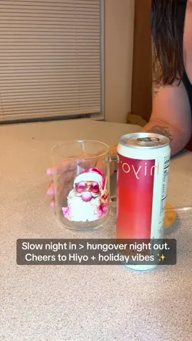 A relaxing evening I’ll actually remember — festive mug, comfy vibes, and my @drink hiyo drinky drinks in hand. Zero hangover, all the holiday unwind energy. Tap to shop the sample pack + try my fave flavors! 🍹💖 #sobertok #mocktail #adaptogenicdrinks #sobercurious #hiyo 