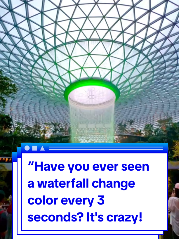 Amidst the hurried footsteps of passengers, the Rain Vortex suddenly glowed bright pink and then neon green. As if reading the mood of Singapore. I recorded every second—and I swear, the results were incredibly aesthetic! #SingaporeAesthetic #GlobalReels #CreatorLife #RainVortexMagic #tkwsingapore 