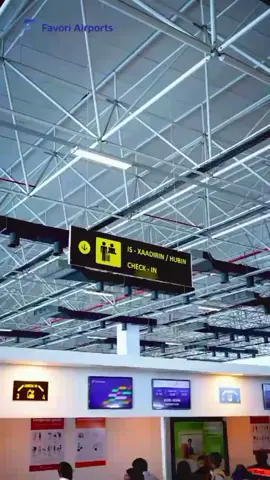 🇸🇴;Check-in Counters: a la dhaha hadi a ✈️🌍, ade lazim wasi mare.!#fyp #flight #check #follow #traveltiktok @Turkish Airlines @Aviation This sign at an airport indicates the direction to check-in counters or baggage drop-off locations. The numbers typically correspond to specific counter or lane numbers where passengers can check in their luggage and receive their boarding passes. How to Use the Sign Follow the Arrows: The arrows guide passengers toward the designated counters, often grouped by airline or flight number, which are indicated by the numbers 1 and 2 in the image. Check Luggage: The icon of a suitcase with a checkmark indicates the location for handling checked baggage that needs to go into the airplane's cargo hold. Procedures: If you have already checked in online, you can proceed directly to the designated 
