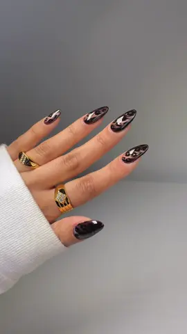 Subtle animal print>> 🐆🤎 using @GELCARE® truffle, jelly brown (link in bio, code ‘GLOSSYTIPPED’ to save*) + cateye polish linked on my amazon page _____ *affiliate #magneticnails #cateyenails #nailideas #nailinspo2025 #winternails 