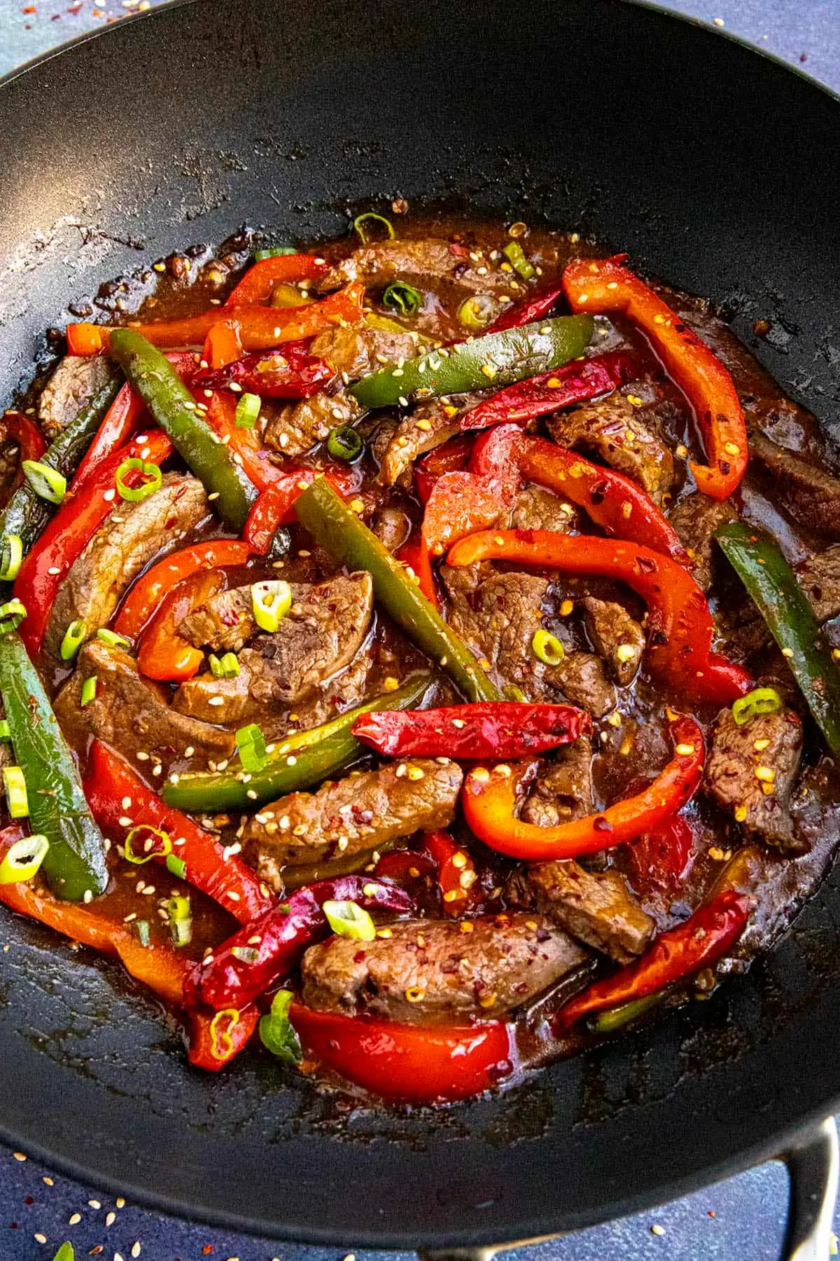 For Stir-Fry 2 tbsp oil 6–8 dried red chilies 1 tbsp garlic, chopped 1 tbsp ginger, chopped 1 medium onion, sliced 1 capsicum (any color), sliced ½ cup spring onion Szechuan Sauce 2 tbsp soy sauce 1 tbsp vinegar 1 tbsp chili sauce 1 tbsp tomato ketchup 1–2 tbsp Szechuan sauce (homemade/market) 1 tsp chili flakes 1 tsp sugar ½ tsp black pepper ¼ cup water 🔥 Instructions 1. Prepare the Beef Mix sliced beef with soy sauce, cornflour, salt, pepper, and 1 tbsp oil. Let it marinate for 15–20 minutes. Heat oil in a pan and stir-fry the beef on high heat until browned and crispy (5–7 minutes). Remove and set aside. 2. Make the Stir-Fry In the same pan, heat 2 tbsp oil. Add dried red chilies and sauté until fragrant. Add ginger & garlic — stir for 10 seconds. Add onion + capsicum and stir fry on high flame for 2–3 minutes. 3. Prepare Szechuan Sauce In a bowl mix: soy sauce vinegar chili sauce ketchup Szechuan sauce chili flakes sugar black pepper water Pour this mixture into the pan. 4. Combine Add the fried beef back into the sauce. Toss on high flame until the beef and veggies are coated well. Add spring onions. Cook 1 more minute and turn off the heat. ✔️ Your Szechuan Beef is ready! Serve hot with 🍚 fried rice, 🍜 noodles, or 🥢 enjoy as a dry starter.