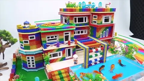 Create a stunning house with a built-in aquarium using magnetic balls! This magnet art build is perfect for creative DIY lovers. #MagneticBalls #Buckyballs #DIYCrafts #MagnetArt #DIYHouse 