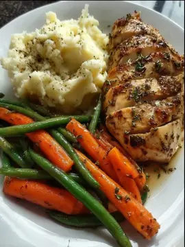 Garlic Herb Chicken with Creamy Mashed Potatoes & Sautéed Veggies 🥕🥔✨ Tender, juicy garlic-herb chicken served with fluffy mashed potatoes and buttery green beans & carrots — a simple, comforting, restaurant-style plate. Ingredients Garlic Herb Chicken 2 chicken breasts 1 tbsp olive oil 1 tbsp butter 2 garlic cloves, minced 1 tsp Italian seasoning 1 tsp paprika Salt & black pepper Optional: splash of balsamic glaze for finishing Mashed Potatoes 3–4 potatoes, peeled & cubed 2 tbsp butter ¼ cup milk or cream Salt & pepper Veggies 1 cup green beans 1–2 carrots, sliced into strips 1 tbsp butter or olive oil Salt, pepper, garlic powder Directions Make the Mashed Potatoes Boil potatoes 10–12 minutes until soft. Mash with butter, milk/cream, salt, and pepper until smooth. Cook the Veggies Sauté carrots and green beans in butter/oil over medium heat. Add salt, pepper, and garlic powder. Cook 6–8 minutes until tender with a slight bite. Cook the Garlic Herb Chicken Season chicken with salt, pepper, paprika, and Italian seasoning. Heat oil and butter in a skillet. Add garlic, then chicken. Cook 6–7 minutes per side until golden and cooked through. Optional: drizzle a touch of balsamic glaze over the chicken. Assemble Plate mashed potatoes high and fluffy, add the veggies, and nestle the chicken beside them. Garnish with parsley if desired. Prep Time: 10 min Cooking Time: 25 min Total Time: 35 min Kcal: ~510 per serving Servings: 2 Enjoy it! 😋  #mumebertha #tiktokviral #garlicherbchicken #creamymashedpotatoes #sauteedveggies 