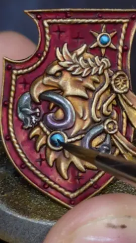Basing miniatures, or parts of miniatures gold is a great way to add a rich tone to other colours. Here the gold helps my contrast layer of Blood Angels red stand out and also lends a metallic look to the finals result! #AdeptusAstartes #DarkAngels #FirstLegion #HorusHeresy #Primarch #Primaris #SpaceMarines #40k #warhammer40k #warhammer40000 #warhammer #warhammer40k #warhammerpainting #paintingwarhammer  #warhammercommunity #paintingminis #miniaturepainting #paintingminiatures  #gamesworkshoppainting #gamesworkshop #warhammerofficial #warhammerminiatures