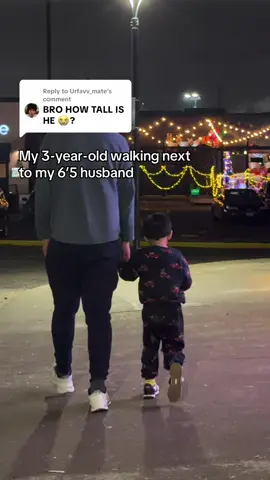 Replying to @Urfavv_mate he is THIS tall walking next to my 6’5 husband. 😂