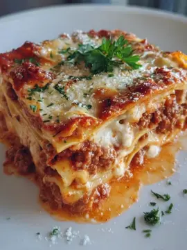 💰 Million Dollar Lasagna Recipe 🇮🇹 🥩 Ingredients: For the Meat Sauce:  * 1 lb ground beef 🐄  * 1/2 lb Italian sausage 🌶️  * 1 medium onion, diced 🧅  * 3 garlic cloves, minced 🧄  * 1 jar marinara sauce (24 oz) 🥫🍅  * 1 can diced tomatoes (14 oz) 🍅  * 1 tsp Italian seasoning 🌿  * 1 tsp salt 🧂  * 1/8 tsp pepper ⚫ For the Creamy Cheese Layer:  * 2 cups ricotta cheese or cottage cheese 🧀  * 1 package (8 oz) cream cheese, softened 🧈🧀  * 1/2 cup sour cream 🥄  * 1 large egg 🥚  * 1 tsp salt 🧂  * 1/8 tsp pepper ⚫  * 1 tsp garlic powder 🧄  * 1 tsp onion powder 🧅  * 1/2 cup grated Parmesan cheese 🧀  * 2 cups shredded mozzarella cheese, divided 🧀 For the Pasta Layer:  * Lasagna noodles, cooked and drained 🍝 👩‍🍳 Instructions:  * Preheat and Prep: Preheat your oven to 375^{\circ}\text{F}. 🔥 Grease a 9x13-inch baking dish and set aside. 🍽️  * Cook the Meat Sauce: In a large skillet over medium heat, cook the ground beef, Italian sausage, and diced onion until the meat is browned and fully cooked. 🍳 Season with salt and pepper. Drain excess grease, then stir in garlic and cook for 1 minute until fragrant. 👃  * Simmer: Add marinara sauce, diced tomatoes, Italian seasoning, salt, and pepper. 🧂 Stir well. Simmer for 10-15 minutes to allow flavors to meld. ♨️  * Prepare the Creamy Cheese Layer: In a mixing bowl, combine ricotta cheese, cream cheese, sour cream, egg, Parmesan cheese, and 1 cup of mozzarella cheese. 🥣 Seasoning with salt, pepper, onion powder and garlic powder. Mix until smooth and set aside. 🤤  * Assemble the Lasagna:    * Spread a thin layer of meat sauce at the bottom of the prepared baking dish. 🥄    * Place a layer of lasagna noodles on top. 🍝    * Spread a portion of the creamy cheese mixture over the noodles, followed by a layer of meat sauce. 🧀🥩    * Repeat the layering process, finishing with meat sauce on top. 🏗️    * Sprinkle the remaining mozzarella cheese evenly over the top layer. 🧀  * Bake: Cover the dish with aluminum foil. 🌫️ Bake in the preheated oven for 25 minutes. ⏱️ Remove the foil and bake for an additional 20 minutes, or until the cheese is bubbly and golden brown. ✨  * Rest and Serve: Let the lasagna rest for 15 minutes before slicing and serving. 😋 Enjoy your Million Dollar Lasagna! 🥳 #tiktokviral #mumebertha #quickrecipes #lasagna #italianfood 