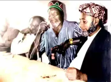 A story a day  SHEIKH OMAR BIN DAHMAN: He was the owner of Malindi Bus, seen here with the first President of the Republic of Kenya, Mzee Jomo Kenyatta in 1961 during Kenyatta’s visit to Malindi to meet ‘mwambao people’ after he had left Kapenguria. Omar Bin Dahman was the first nominated councilor of Malindi in 1958, served for 20 years and retired in 1978. While serving as a councilor he also worked with his elder brother Sheikh Ahmed Bin Dahman in business (as a trader, supplying provisions from Shimo la Tewa all the way to Hola) and farming in Malindi. He served as chairman of Malindi Farmers Co-perative Society, exporting mangoes and supplying local markets with other farm produce. He was a proprietor of Malindi Buses in 1980’s as a registered transport company. Sheikh Omar interacted without discrimination with people from other races, teaming up to facilitate the reconstruction of the Jamia Mosque with people like Aliyaan, Bakshwein, Salim Baluchi amongst other elders in Malindi to fundraise towards construction of the Jamia Mosque in late 50’s. He died in 1984 in Abu Dhabi after a short illness. another great kenyan company that went belly up when the successors failed to agree on how the business should be ran.