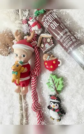 Santa Reindeer and Robby 🎅🏼  Featuring the authentic Santa Reindeer and Robby from Sonny Angel’s 2020 Christmas series. Reindeer is dressed in Santa attire and holding Robby dressed in a bow tie and Santa hat. They come with a cozy faux fur and shearling glove, red and white striped and tan rope charms, Broadway cocoa coconut oil lip gloss and festive charms including gingerbread man cocoa, Santa penguin, polar bear and more! 🏠 🍁  Available in my Etsy store! #christmas #sonnyangel #santa #accessories #lipgloss 