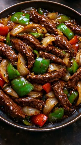 🥩🌶️ Easy Crockpot Pepper Steak  How about preparing this recipe for your Thanksgiving? 🥰  A comforting slow-cooked dish where tender beef strips simmer with peppers and onions in a rich, savory sauce — perfect for a no-stress dinner. Ingredients: 1 1/2 lbs sirloin or flank steak, thinly sliced   2 bell peppers (any color), cut into strips   1 onion, thinly sliced   3 cloves garlic, minced   1/4 cup soy sauce   1/4 cup beef broth   2 tbsp brown sugar   1 tbsp Worcestershire sauce   1 tbsp cornstarch   1/4 tsp crushed red pepper flakes (optional)   Salt and pepper, to taste   Cooked rice or noodles, for serving   Fresh parsley or sliced green onions, for garnish   Directions: Make the sauce: In a small bowl, whisk together soy sauce, beef broth, brown sugar, Worcestershire sauce, and cornstarch until smooth. Set aside.   Assemble in the slow cooker: Add the sliced beef, bell peppers, onion, and garlic to the crockpot. Pour the sauce over everything and toss gently so all ingredients are coated.   Cook: Cover and cook on Low for 6–7 hours or High for 3–4 hours, until the steak is tender and vegetables are soft. For a thicker sauce, remove the lid during the last 30 minutes of cooking.   Serve: Give it a stir and spoon the pepper steak over hot rice or noodles. Finish with fresh parsley or green onions.   Prep Time: 10 minutes  Cook Time: 6–7 hours (low) or 3–4 hours (high)  Total Time: 6–7 hours  Calories: ~350 per serving  Servings: 4  If you want more recipes like this, just follow my profile...  🥰😍😋 #FoodTok #food #thanksgiving  #usa #tiktokusa 
