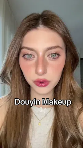 Tutorial de Douyin Makeup! Trouxe uma versão bem convencional, o que acharam? Penso que uma boca mais nude tambem ficaria linda. Produtos usados❤️  Hidratante oil control Isdin Primer soft blur ruby rose Corretivo Natasha Denona 1N Bruma Fresh Beauty Petrizi Blush Peony Mascavo Base BT f30 Corretivo Satin Vizzela 2 Corretivo Klasme (tom mais claro ( SOFIABLACK cupom) Pó solto Bauny Contorno Artclass by Rodin Too Cool For School Paleta de sombras muted nuts dasique  Delineador Vic Beaute marrom Máscara de cílios Wonderlash BT Máscara de cílios peel off panda Dailus Blush aperol spritz tower 28 Blush Fwee mellow duo Follow Me Soft Focus Blurring Matte Bronzer Hung Vanngo “straightforward” Iluminador Canmake Munyutto cor 2 Lip oil rare beauty affection #maquiagem #TikTokBeleza #maquiagembrasil 