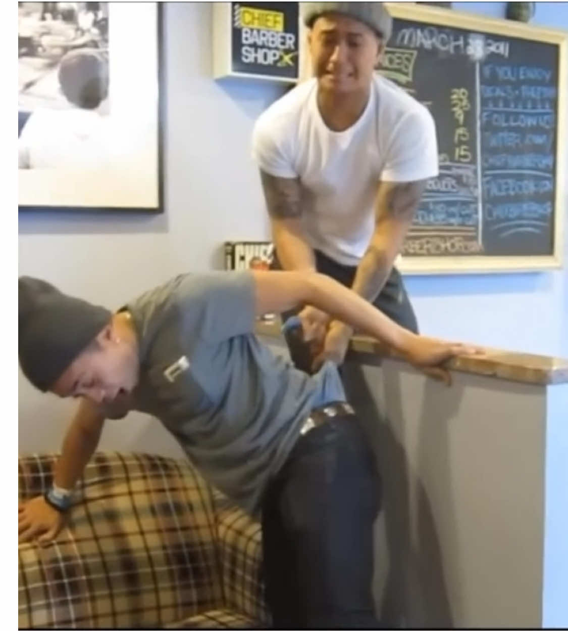 Guy gives his friend a major wedgie at the barber #wedgie #wedgiemen #wedgietime #wedgieprank #ouch 