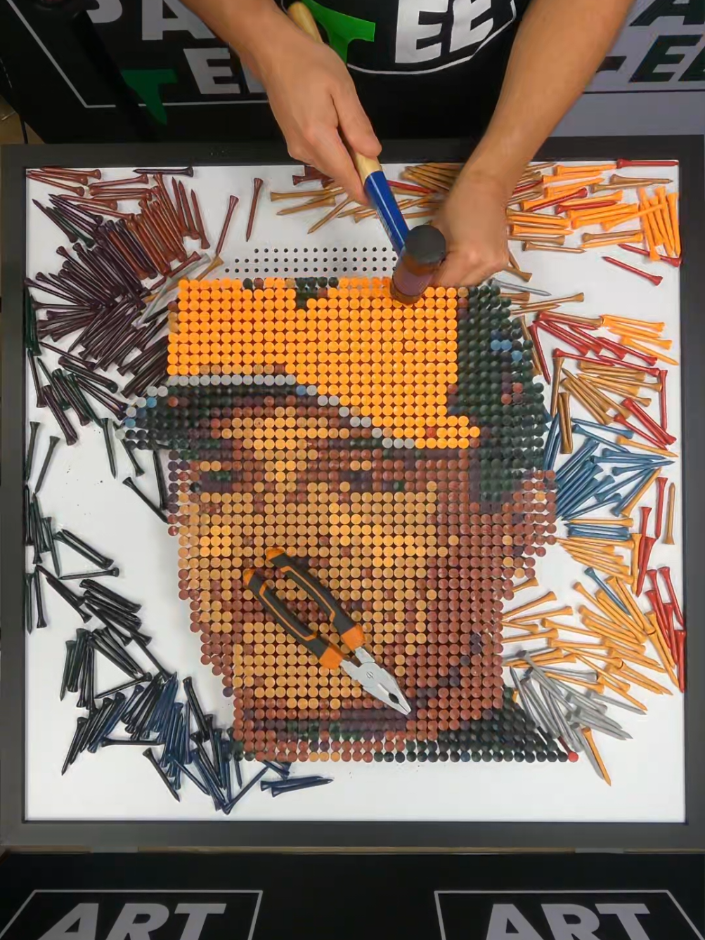 Am I right with this? 🏎️🟠 This golf tee art of @lando took 8 hours to make and used over 2,500 golf tees and is one of our favourites yet. If you're new here, welcome! We take thousands of golf tees and we turn them into portraits of sporting legends, capturing iconic moments from football, golf, Formula 1 and beyond ⚽🏎️🏌️ Every piece is handcrafted, built from real golf tees and designed to bring the energy of the sport to your walls - whether that's your sports venue, your business or your home  🎯 Follow @artpartee_ for more golf tee builds and sports inspired artwork celebrating legends of the game  📩 DM us for custom pixel artwork for your home, office, or venue 🔗 Check out our DIY golf tee art kits and digital prints at www.artpartee.com  #SportsArt #F1Art  #MotorsportArt #landonorris 