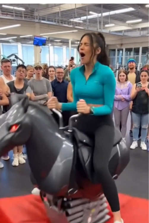 Runaway Rodeo Machine Goes Wild in Gym! Japanese Beauty’s Reaction Has Everyone Laughing 🤣🐎 A normal workout turns into a full comedy show when a glamorous Japanese woman tries out a bucking-bronco-style exercise machine… and it suddenly malfunctions at full power! The mechanical horse begins vibrating with extreme, industrial-level intensity — shaking wildly like a broken factory robot.   Her exaggerated reactions, flying hair, and cartoonish expressions make the chaotic scene absolutely hilarious. The crowd of 20–30 gym-goers goes from stunned silence to uncontrollable laughter as the machine thrashes out of control.   When it finally shuts down, she slides safely onto a padded mat in a harmless, funny fall and ends with an embarrassed smile. This photorealistic scene is bright, cinematic, wholesome, and completely non-sexual — a perfect “gym equipment fail” moment captured in comedy form. #G#GymFailF#FunnyVideoM#MechanicalHorseR#RodeoMachineW#WorkoutFail     
