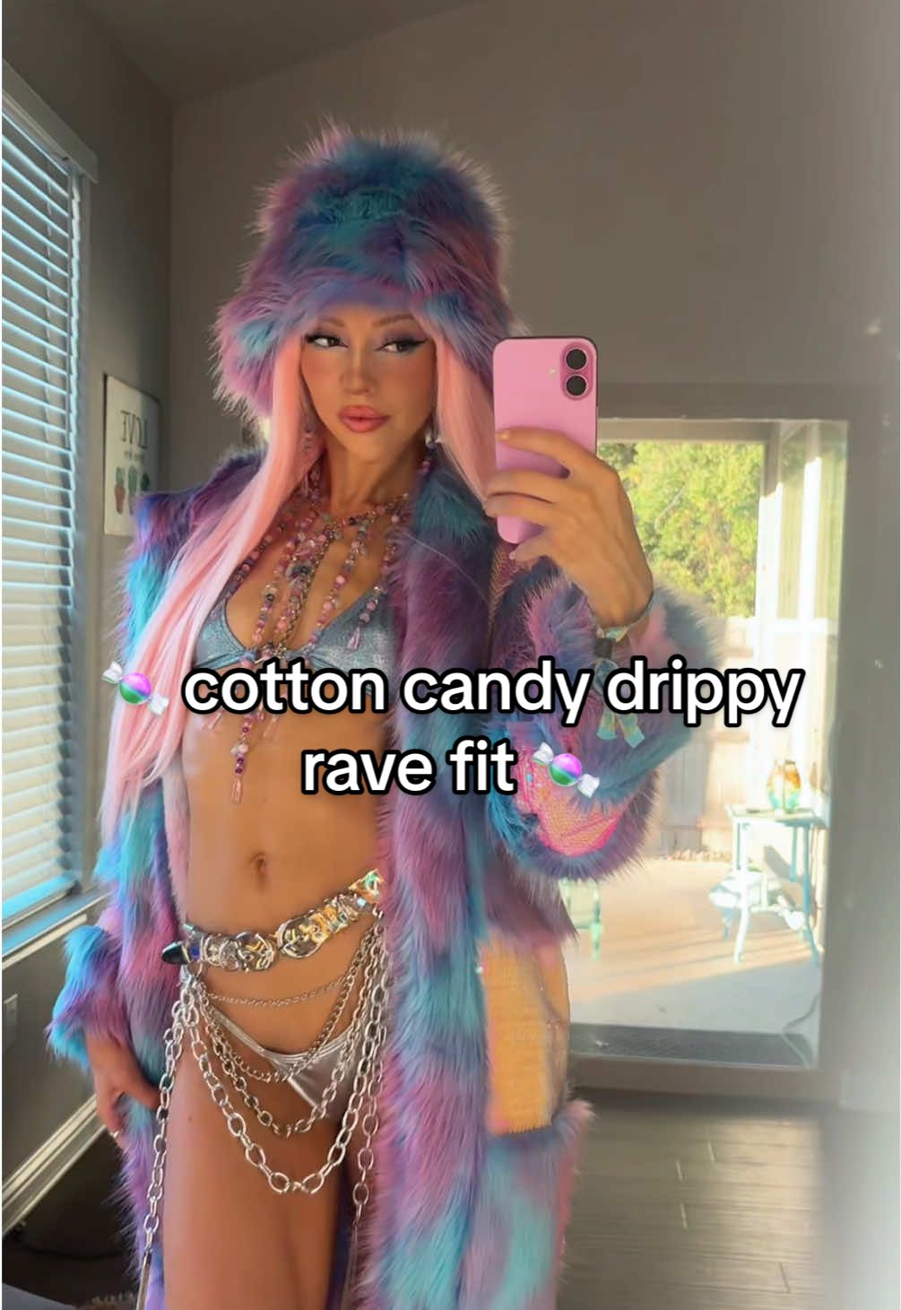 warm n drippy for day 3 of Beyond Existence wearing the magical Arcane Mystics Co. by  @phoxxmystic necklace + earrings set and @SPACE ISLΛND faux fur coat + bucket hat + iridescent chain belt 💖🩵🍬 #dreamstate #festivalfashion #fauxfur 