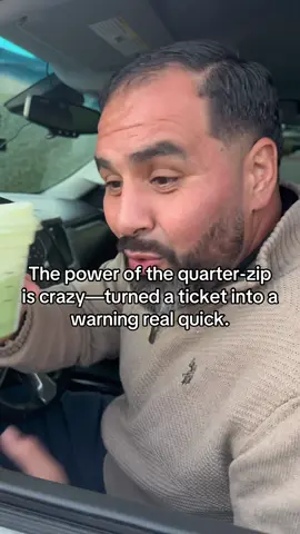 The power of the quarter-zip is crazy—turned a ticket into a warning real quick.