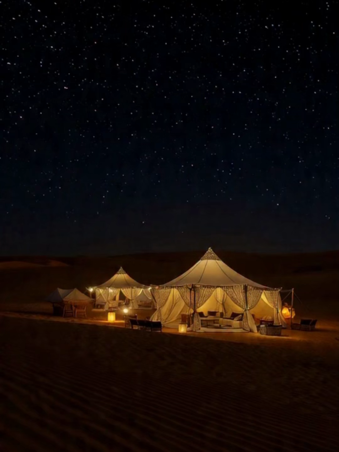 Desert Luxury Retreat – Chiaroscuro Night A refined moonlit desert hideaway surrounded by soft rolling dunes, glowing lanterns, and deep shadow contrasts. Minimalist luxury touches, warm textures, and a calm, mysterious nighttime mood shape this elegant desert escape. #DesertRetreat #LuxuryEscape #NightAesthetic #TravelVibes #DesertLuxury