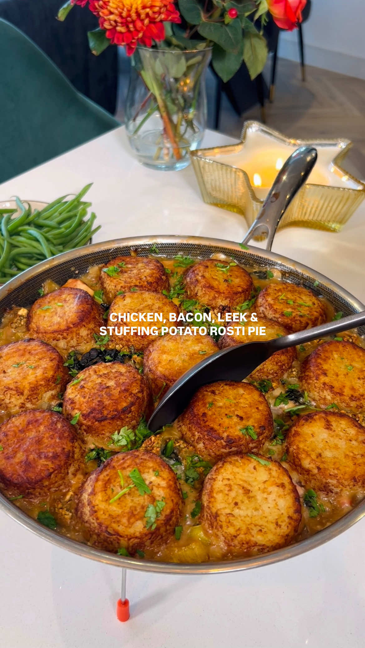 Chicken, bacon, leek and stuffing rosti pie.. Swap out the mash/pastry for rostis’ on the days you want a quick comforting family dinner. Click save and share/tag somebody who would love this! Follow me for more @jadecarolanfitness Macros👇 Calories 642 Protein 46g Fat 27g Carbs 53g Ingredients👇 200g green beans 100g cavolo nero 1 leek 1 shallot 10g butter 100g bacon lardons 600g diced chicken breast 2 tsp chopped garlic 1tsp black pepper finely chopped fresh thyme and rosemary 1 chicken stock pot (500ml water) 40g creme fraiche 90g sage and onion stuffing  750g frozen potato rosti cornstarch slurry (4tsp) salt fresh parsley Partially cook the rostis in the oven/air fryer for 10 minutes. Pan fry diced chicken and bacon lardons in garlic for a few minutes. Season with salt, pepper, rosemary and thyme. Remove from the pan.  Add sliced shallot, leek and kale, fry for a few minutes until soft. Add chicken stock, cornstarch slurry to thicken and a dollop of creme fraiche.  Mix the chicken and bacon through and leave to simmer. Remove for the heat and crumble a layer of sage and onion stuffing on top. Top with the rostis and bake in a preheated oven for 25-30 mins at 200.  Serve with a side of green beans.  Let me know if you try!  - - - - #healthyrecipes #highprotein #EasyRecipes #familydinners #comfortfood 