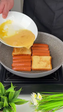#VNVideoEditor                                        THE BEST BREAD AND SAUSAGE  BREAKFAST RECIPE.                                  THE BEST BREAD AND SAUSAGE BREAKFAST RECIPE INGREDIENTS: ●Vegetable oil - 1 tbsp. ●Bread slices - 2 pcs. ●Eggs - 2 pcs. ●Salt - 1/2 tsp ●Butter - 20 g ●Sausages - 4 pcs ●Milk - 50 ml ●Tomato - 1 pc ●Whole piece of cheese (20 g) - 2 pcs ●Parsley - 10 g ●It's incredibly delicious and very simple!!!● Bon appetit! The recipe in your language is available in the description, 💖🇺🇦🇵🇱🇩🇪🇺🇸🇫🇰🇪🇸🇵🇹🇮🇹🇷🇴 🇷🇸🇭🇷🇱🇻🇸🇮🇨🇿🇫🇮🇸🇪🇩🇰🇳🇴 🇯🇵 🇬🇷 🇮🇱🇰🇿🇰🇬🇱🇻🇹🇼 🇵🇪 🇦🇷 🇨🇱 🇻🇪 🇹🇭 🇧🇷                        #breakfast #sandwich #Recipe #simplydeliciousrecipes 